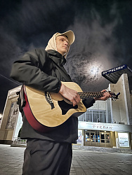 Репетитор по игре на гитаре